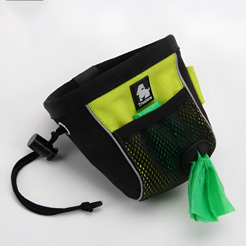Green dog training waist bag with removable waste pouch, worn on hip, showing Oxford cloth material and buckle.