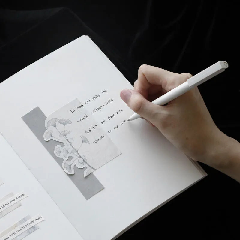 Soft imitation leather notebook with bronzing in red, A5 size, opened to dot matrix pages