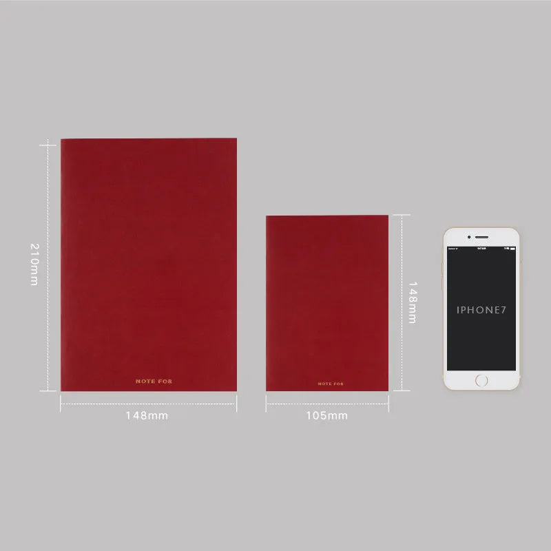 Soft imitation leather notebook with bronzing in red, A5 size, opened to dot matrix pages