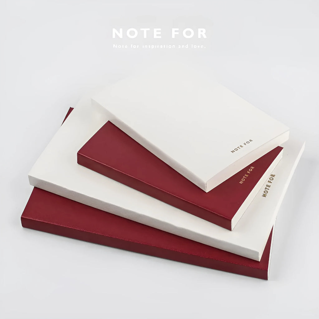 Soft imitation leather notebook with bronzing in red, A5 size, opened to dot matrix pages