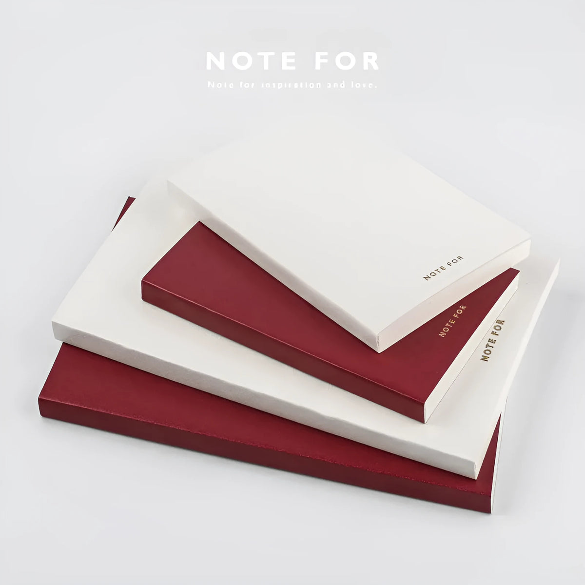 Soft imitation leather notebook with bronzing in red, A5 size, opened to dot matrix pages