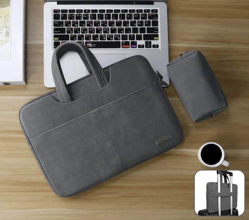 Blue waterproof PU leather laptop bag open, showing internal shock-resistant liner, zipper pocket, and phone compartment.