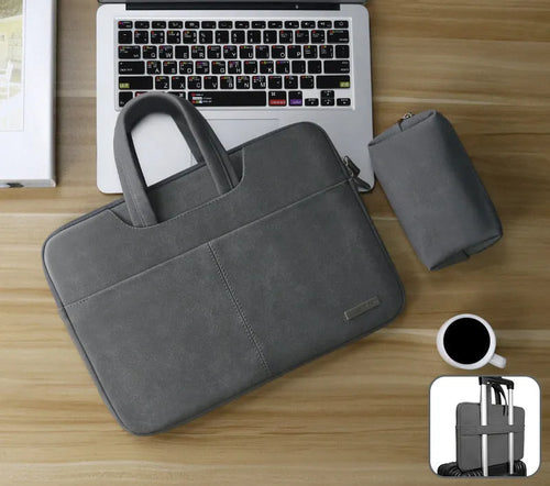Blue waterproof PU leather laptop bag open, showing internal shock-resistant liner, zipper pocket, and phone compartment.