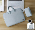 Blue waterproof PU leather laptop bag open, showing internal shock-resistant liner, zipper pocket, and phone compartment.