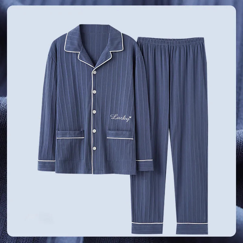 Antarcti men's long sleeve cotton pyjama set with front clasp in solid colour lying flat on white background