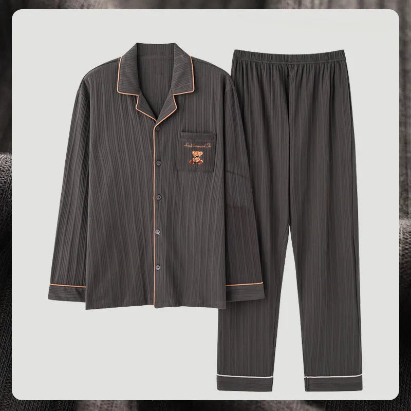 Antarcti men's long sleeve cotton pyjama set with front clasp in solid colour lying flat on white background