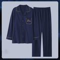 Antarcti men's long sleeve cotton pyjama set with front clasp in solid colour lying flat on white background