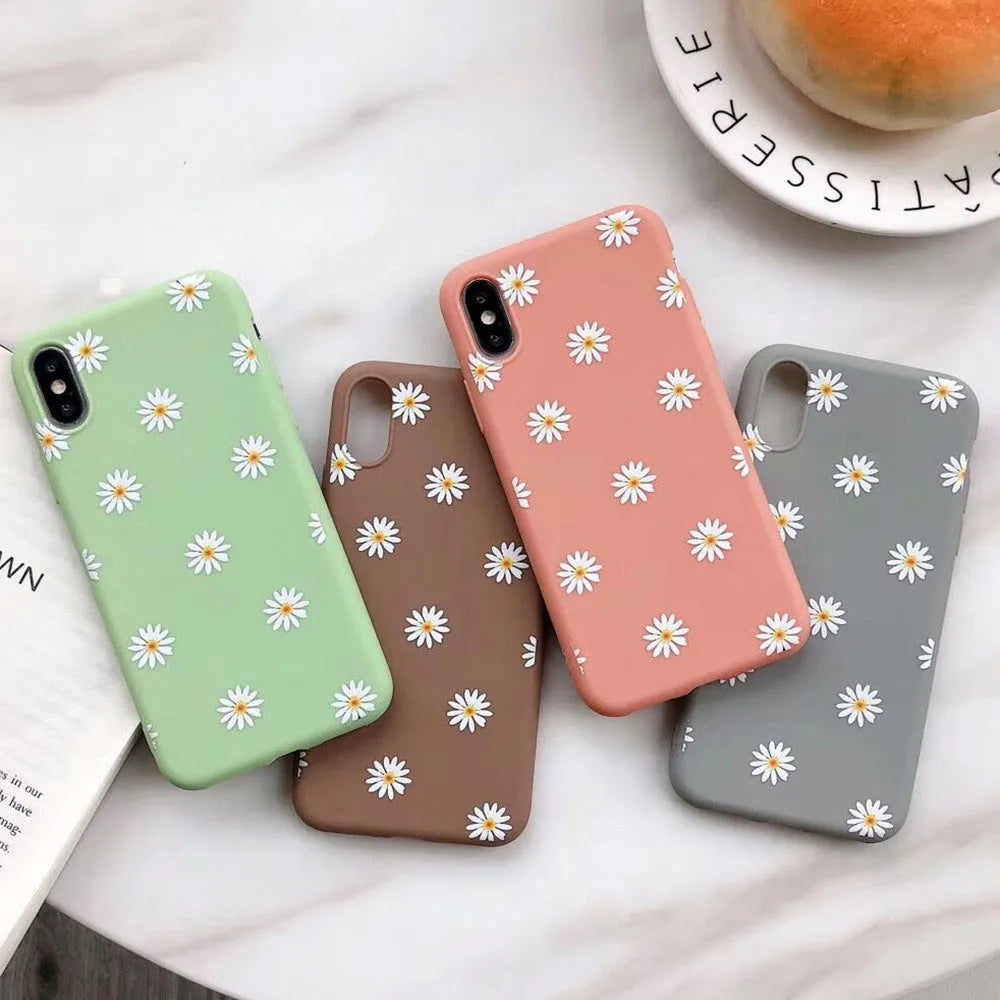 Daisy floral glass phone case in orange, gray, green and brown, compatible with iPhone 6 to 12 and SE 2020.