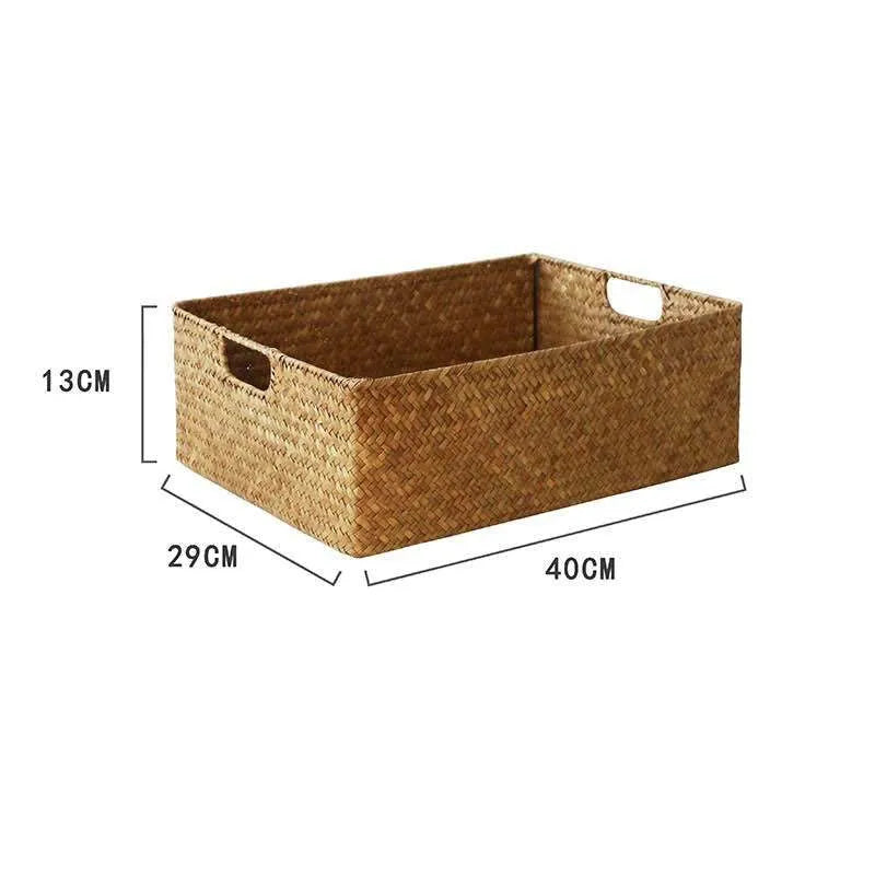 Handwoven grass rectangular storage baskets in various sizes on a wooden shelf
