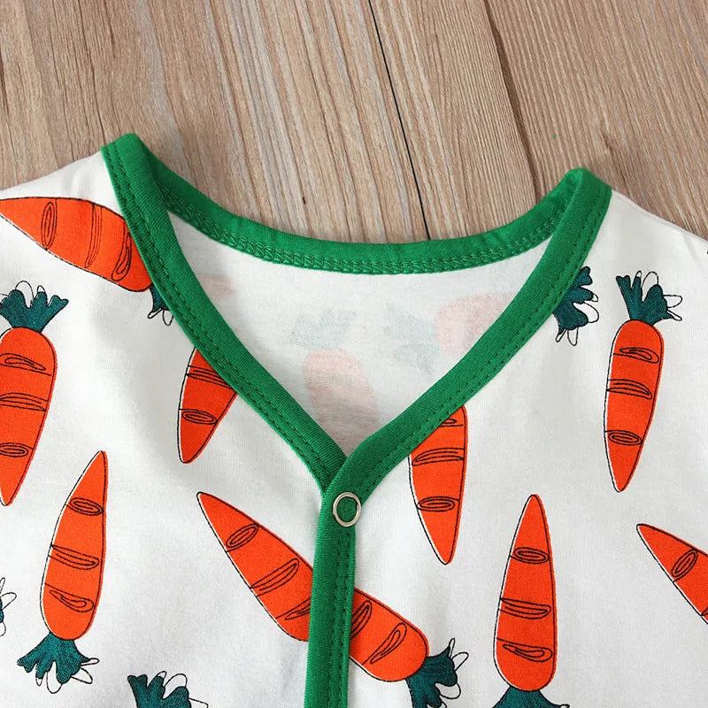 Red cotton V-neck baby romper jumpsuit with long sleeves for a child.