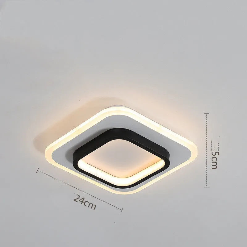 Black finish LED corridor light with acrylic diffuser on indoor wall