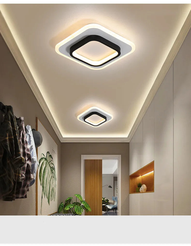 Black finish LED corridor light with acrylic diffuser on indoor wall