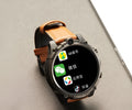 Black smart phone watch with 1.6 inch screen showing heart rate display and dual camera visible on case