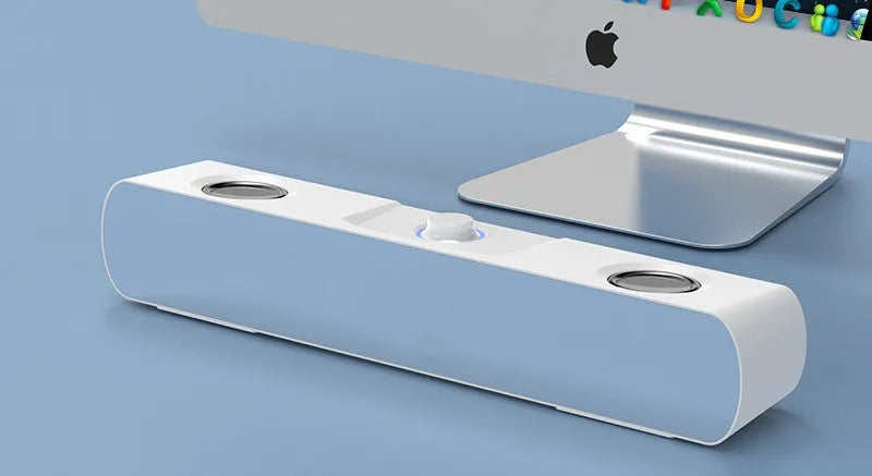 Small black desktop computer speaker with mirror finish and Bluetooth connectivity