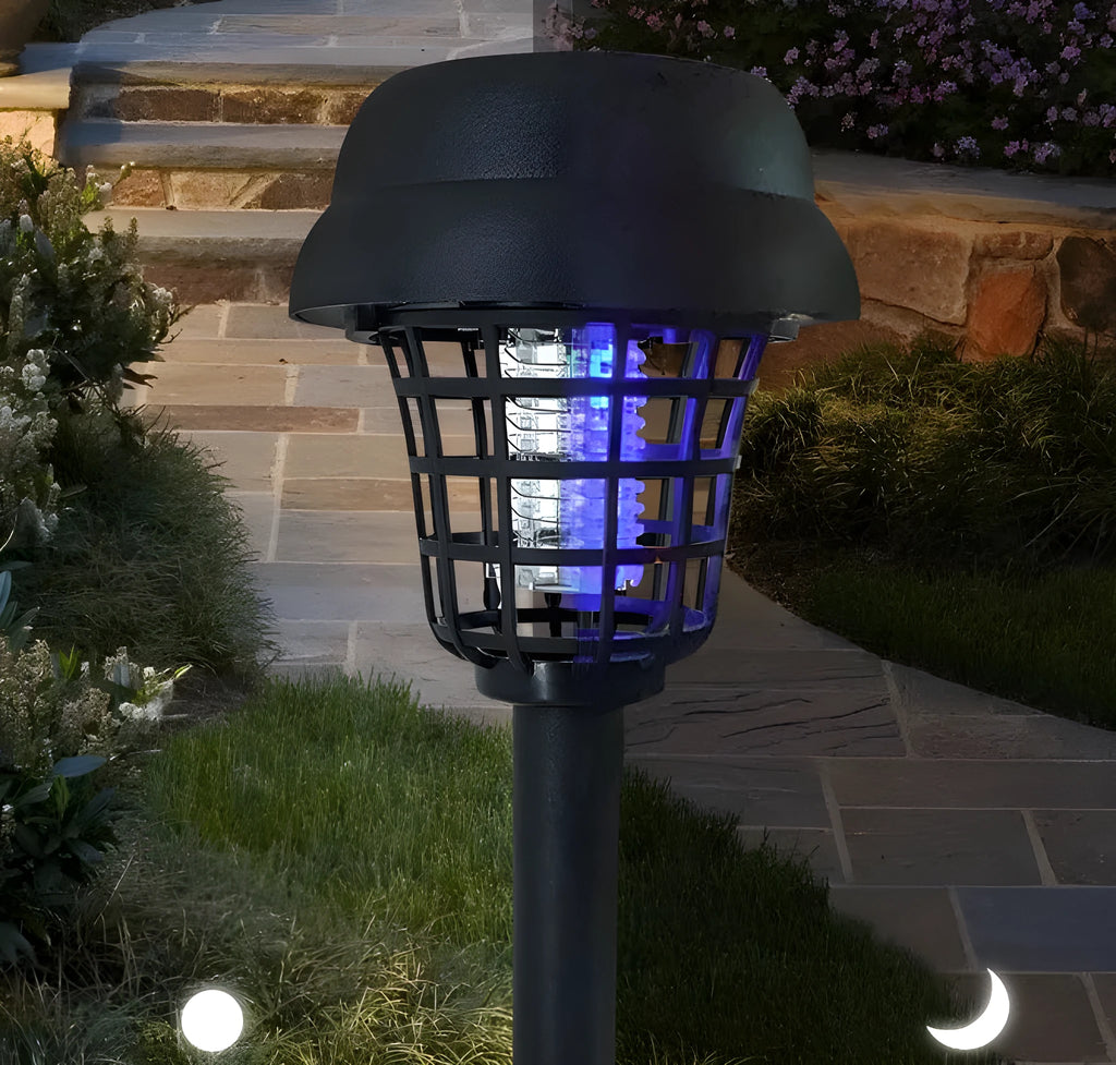 Solar mosquito killer lamp with white light and purple insecticidal glow for outdoor use