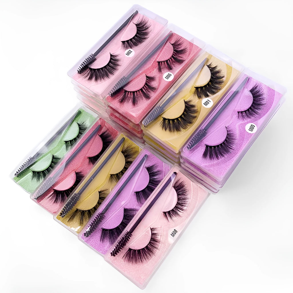 Pair of natural 3D imitation mink false eyelashes with brush in elongated eye-tail style