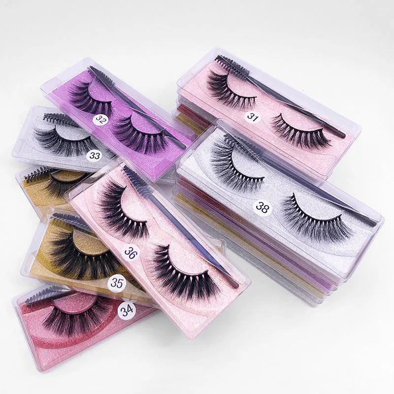 Pair of natural 3D imitation mink false eyelashes with brush in elongated eye-tail style