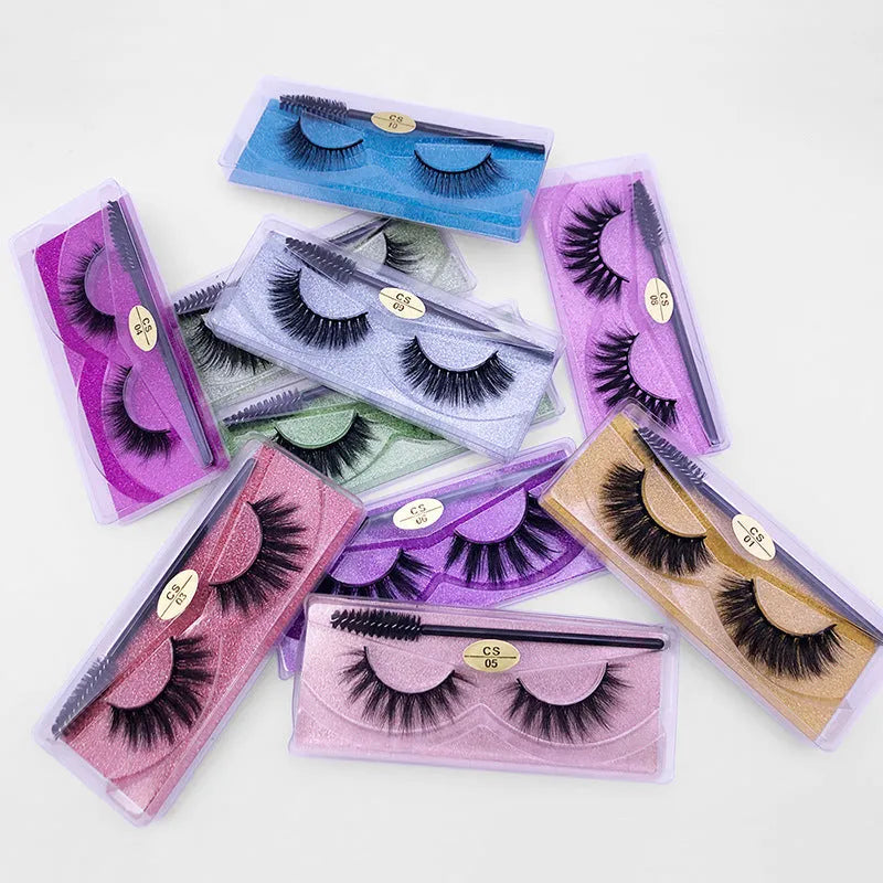 Pair of natural 3D imitation mink false eyelashes with brush in elongated eye-tail style