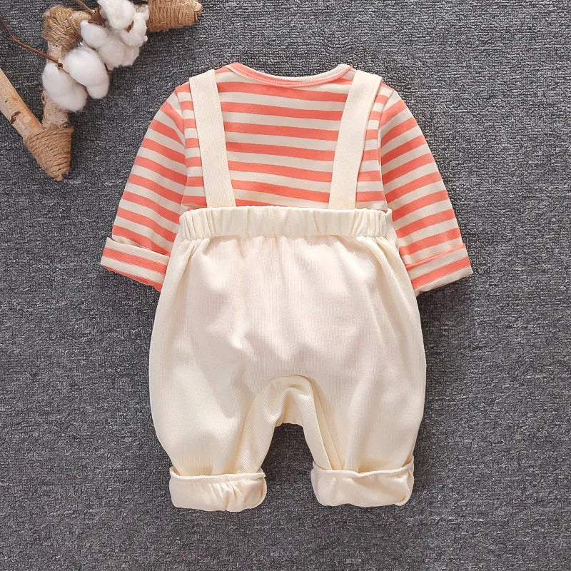 Baby elephant two-piece suit in creamy white with long sleeves, snap button crotch, and round neck design on soft cotton fabric.