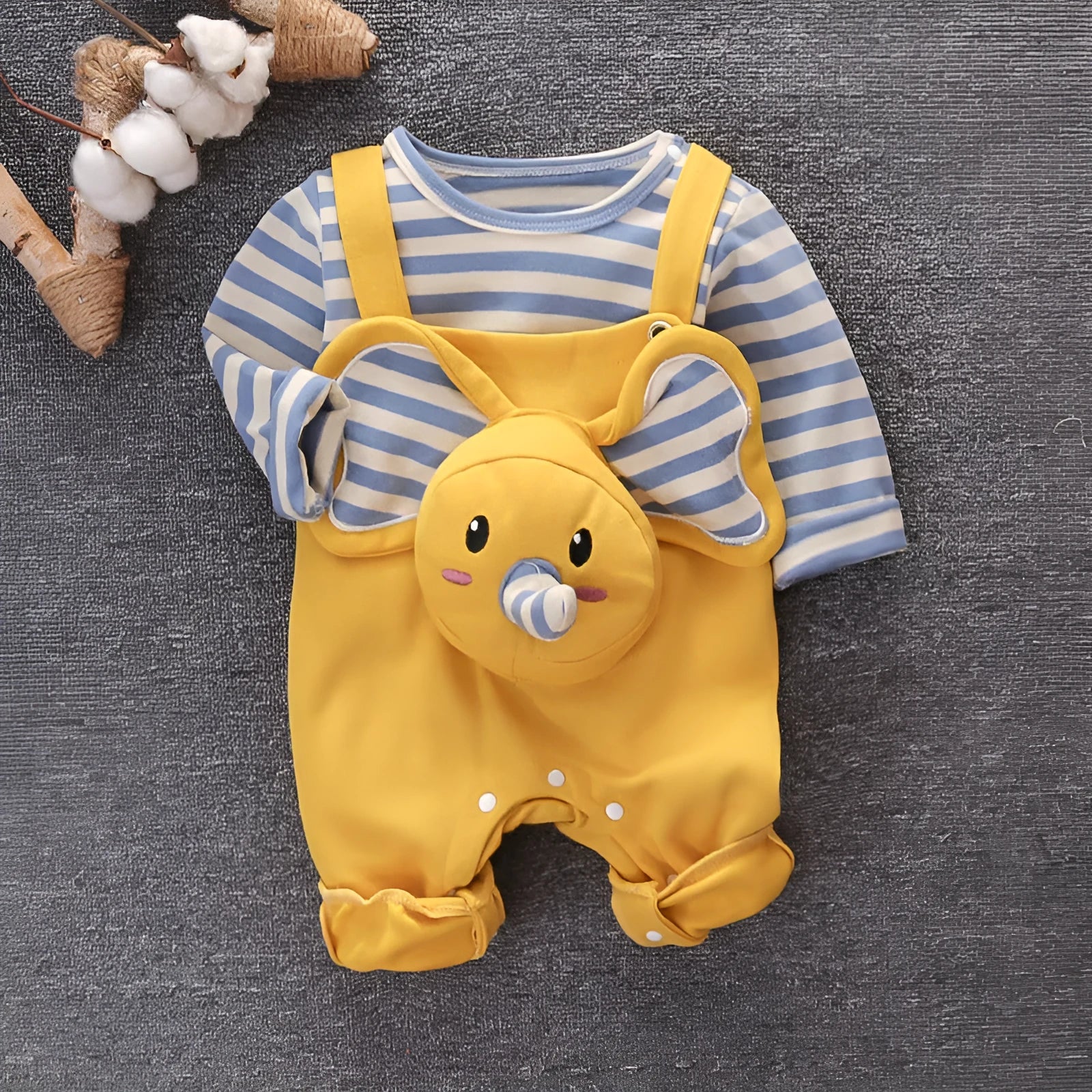 Baby elephant two-piece suit in creamy white with long sleeves, snap button crotch, and round neck design on soft cotton fabric.