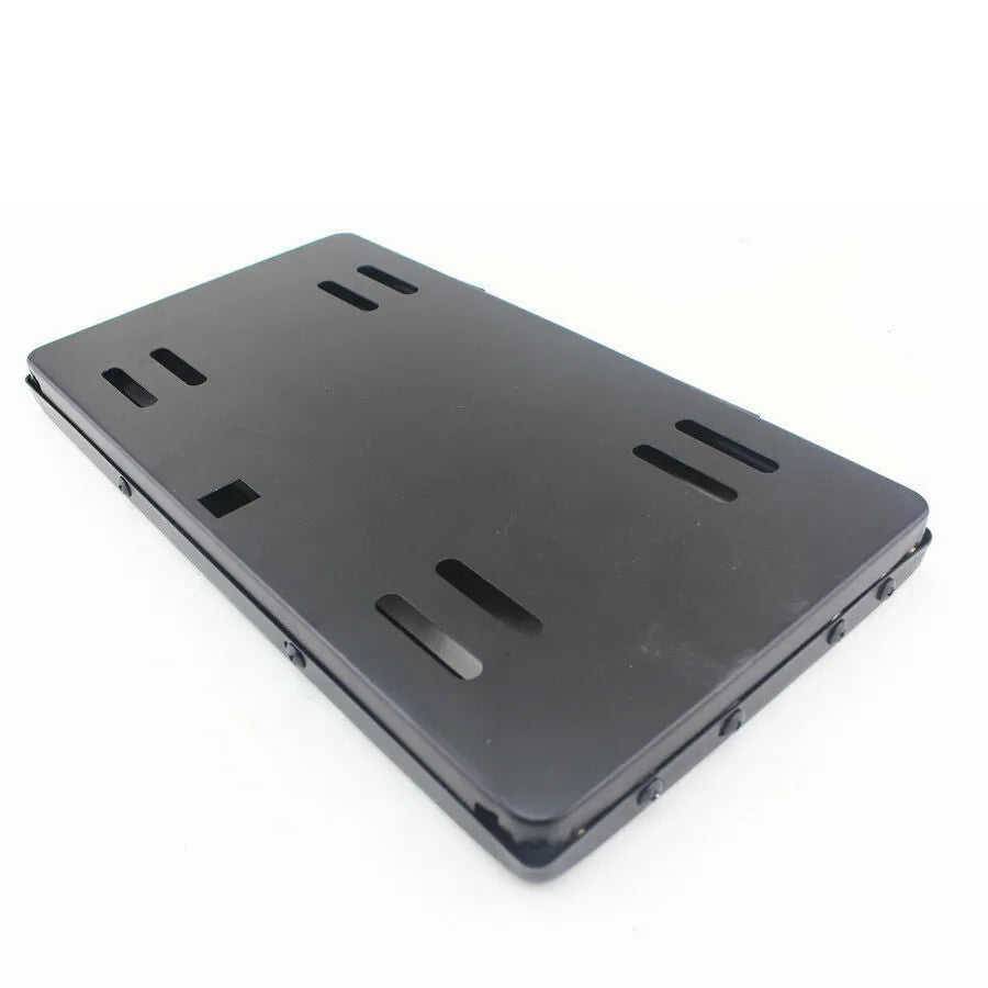 Black flipping license plate frame, 314 x 169 mm, for U.S. license plate size, iron and plastic construction.