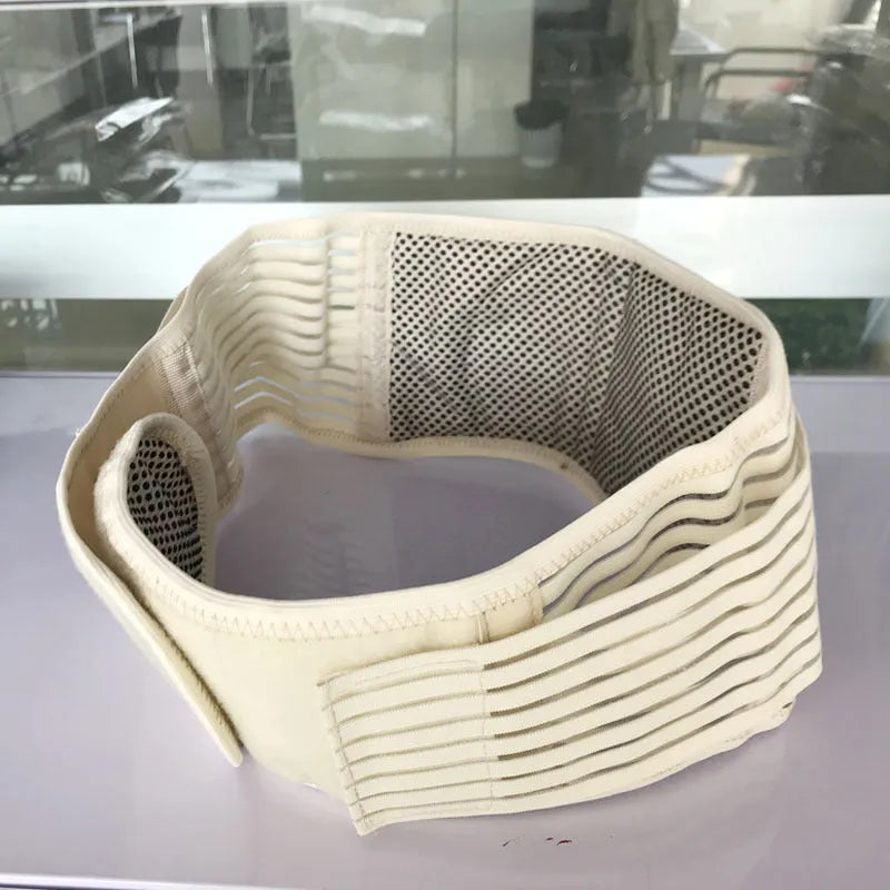 Beige self-heating waist belt with magnetic therapy, adjustable for lumbar support on mannequin.