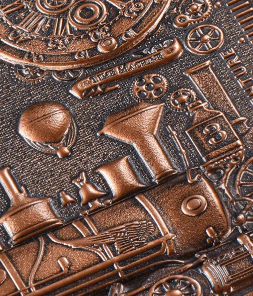 Retro embossed A5 notebook in green bronze, showing textured leather cover and open, lay-flat pages.