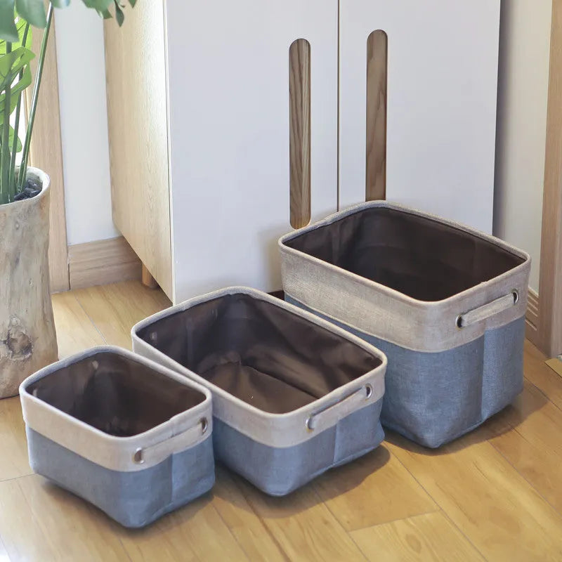 Nordic style fabric folding storage box in blue, coffee, or grey colour, shown in small, medium, large, and extra large sizes.