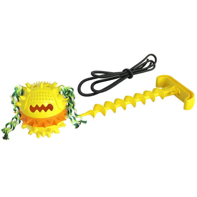 Bright yellow TPR dog draw rope ball for teething and fetch on grass