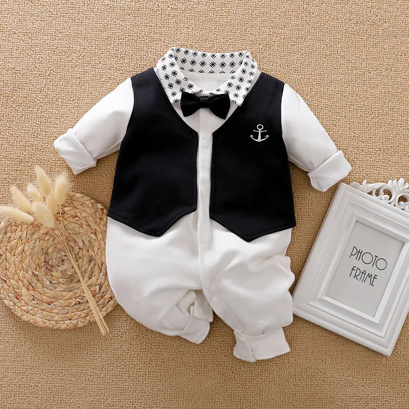 Baby boy wearing cotton jumpsuit in gentleman style with long sleeves for spring or autumn