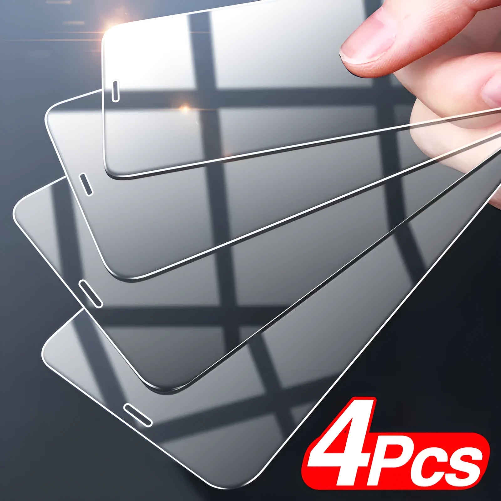 Four-pack of clear tempered glass screen protectors for iPhone with anti-blue light feature on a cleaning cloth
