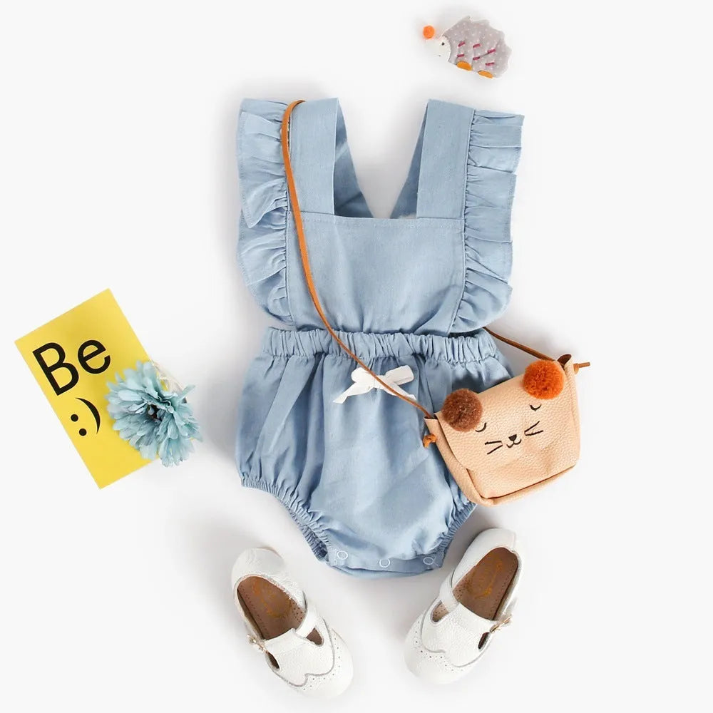 Blue denim sleeveless baby romper with princess styling and triangle climb closure