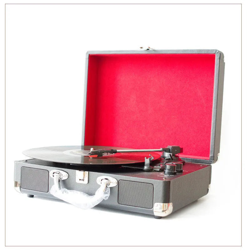 Portable retro vinyl record player with Bluetooth speaker in PU leather case, plays 7 10 12 inch records