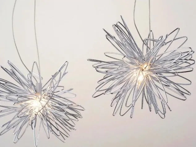 Aluminium wire star moon chandelier with zinc alloy frame and adjustable suspension.