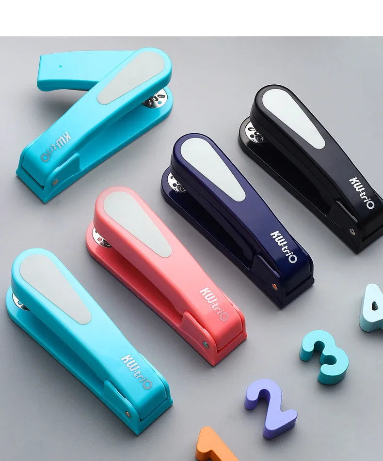 360-degree rotatable desktop stapler in dark blue, shown binding sheets of A4 paper.