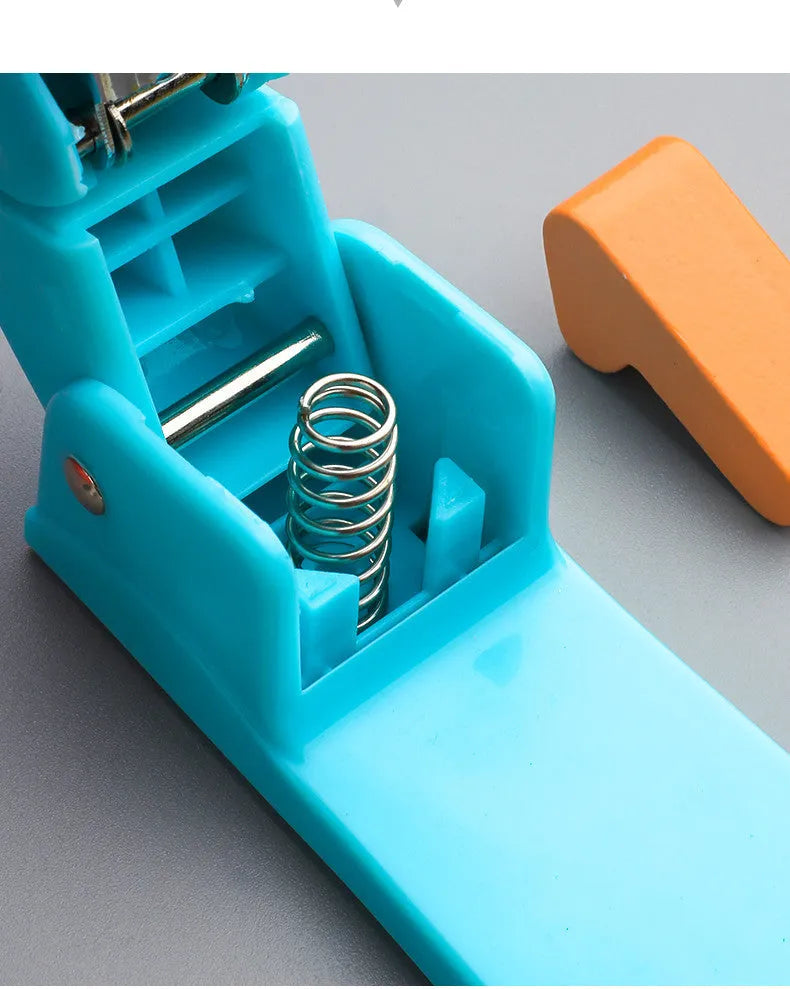 360-degree rotatable desktop stapler in dark blue, shown binding sheets of A4 paper.