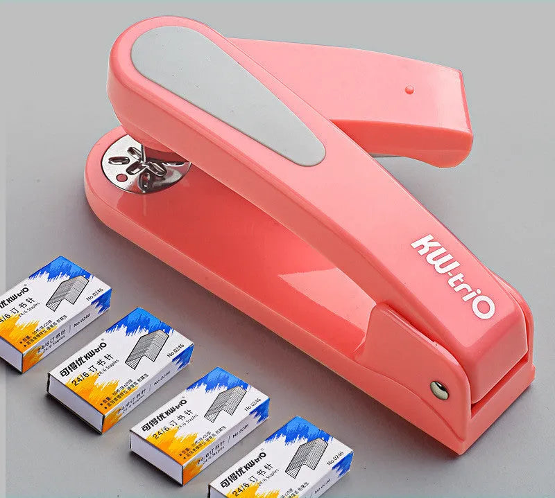 360-degree rotatable desktop stapler in dark blue, shown binding sheets of A4 paper.