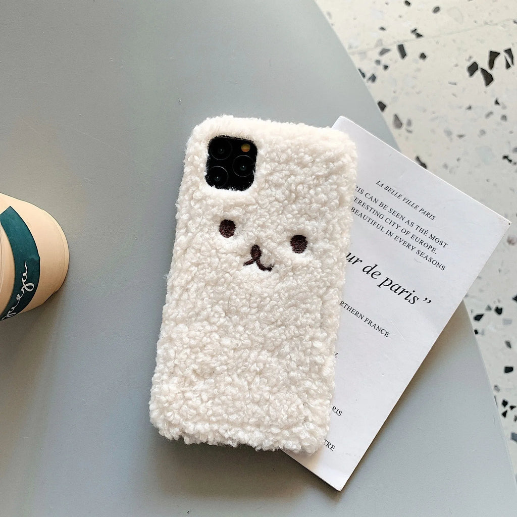 Embroidery plush bear face design on a flexible brown TPU phone case for iPhone