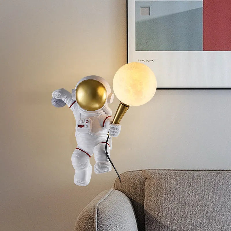 White astronaut desk lamp shown in standing, seated, and wall-mounted configurations