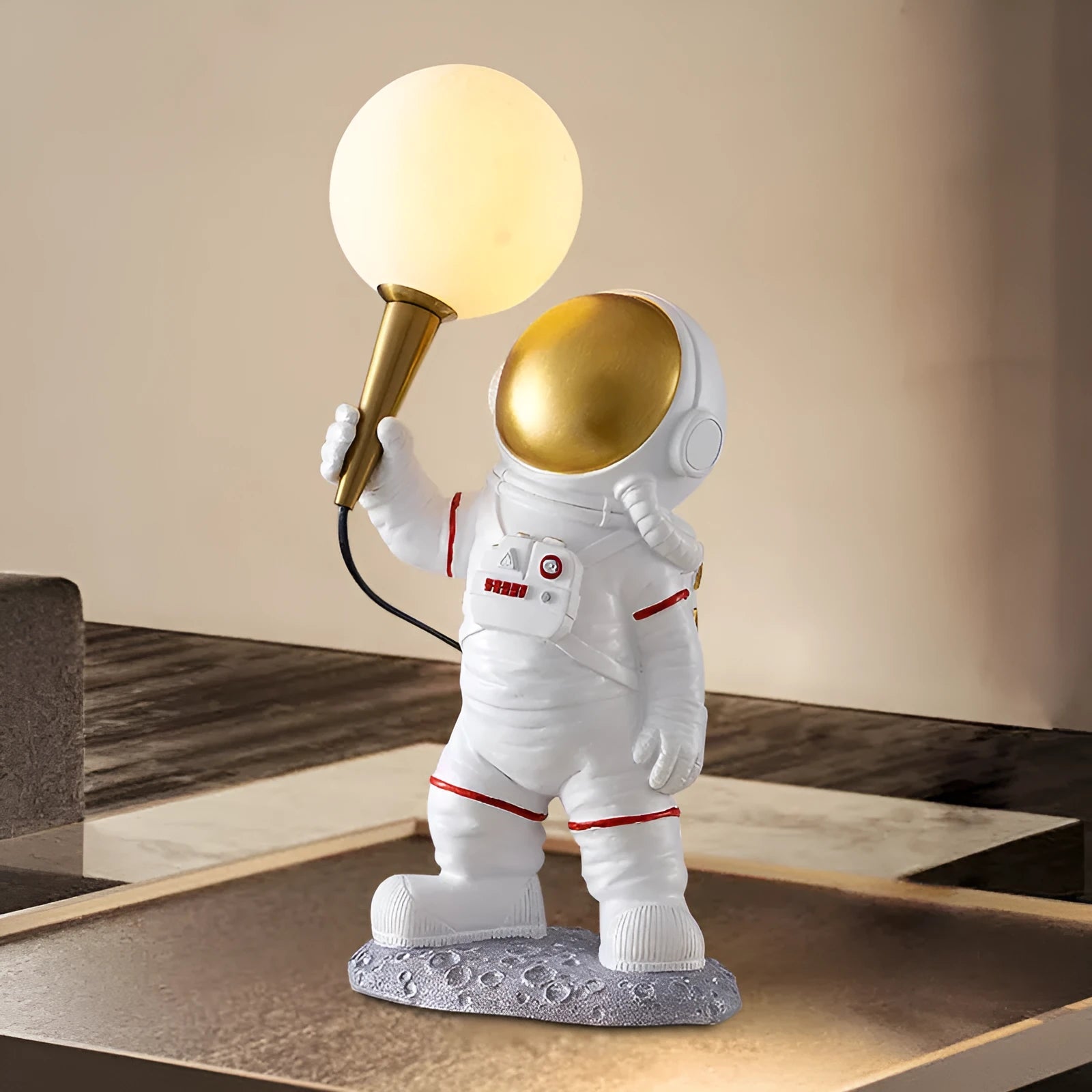 White astronaut desk lamp shown in standing, seated, and wall-mounted configurations