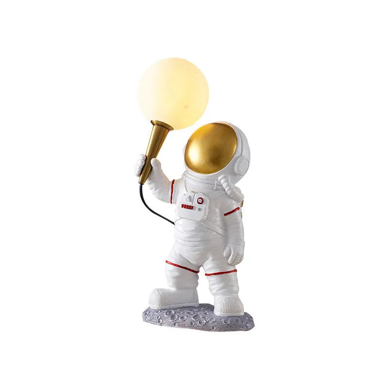 White astronaut desk lamp shown in standing, seated, and wall-mounted configurations