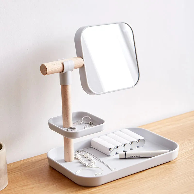 Beech wood desktop cosmetics storage box with mirror, 27x19x30cm, in grey finish, holding makeup brushes and lipsticks on a dressing table