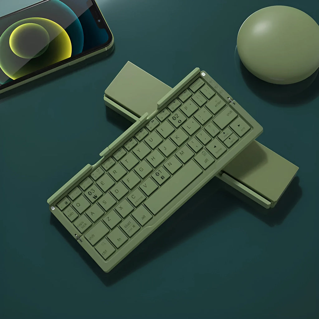 Silver white folding Bluetooth keyboard open with stand holding a smartphone, shown next to its closed compact size.