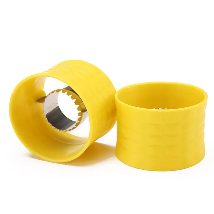 Yellow manual corn grinder thresher kitchen gadget with corn kernel shaped handle.