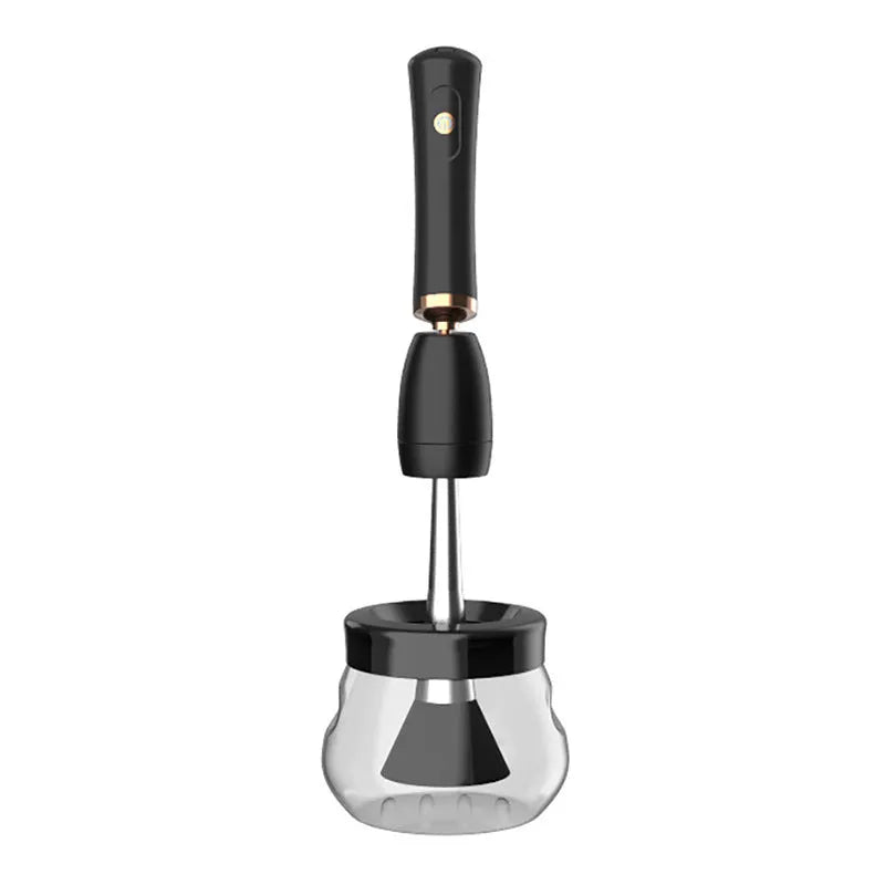 Black makeup brush cleaning machine with silicone head and portable plastic handle on white background