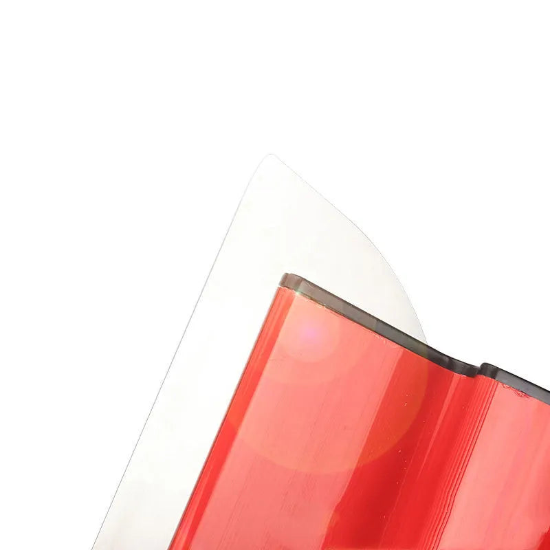 Red leveling scraper tool with a 40cm long blade for wall preparation.