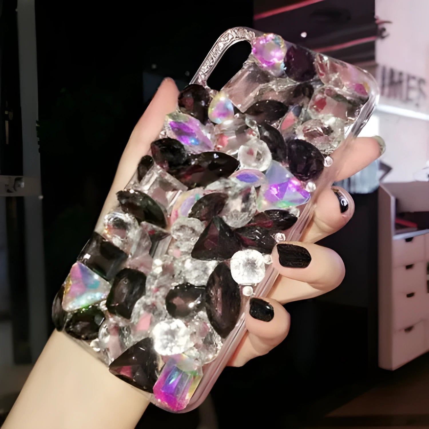 Clear TPU iPhone case with luxury crystal rhinestone decoration on back, compatible with multiple iPhone models