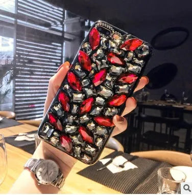 Clear TPU iPhone case with luxury crystal rhinestone decoration on back, compatible with multiple iPhone models
