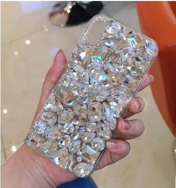 Clear TPU iPhone case with luxury crystal rhinestone decoration on back, compatible with multiple iPhone models