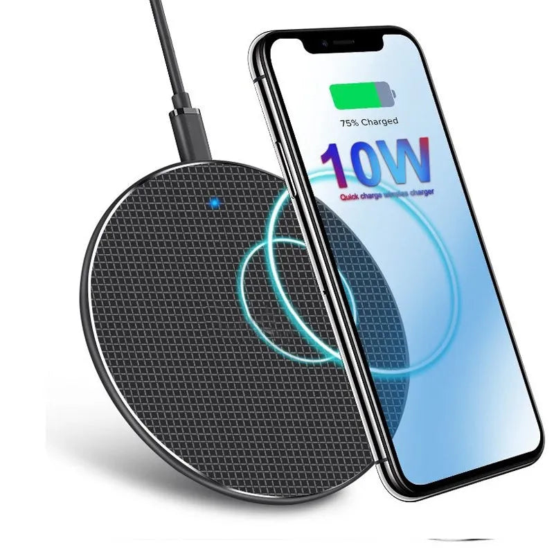 Black aluminum wireless charging pad with phone showing charging indicator light